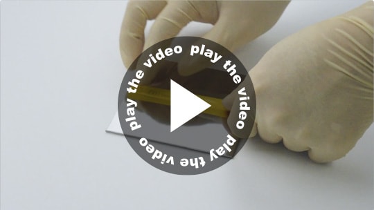 テープ粘着テスト（非粘着コーティング：なし）動画のサムネイル画像。クリックで動画を表示する。